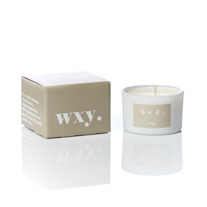 wxy. warm musk + black vanilla candle